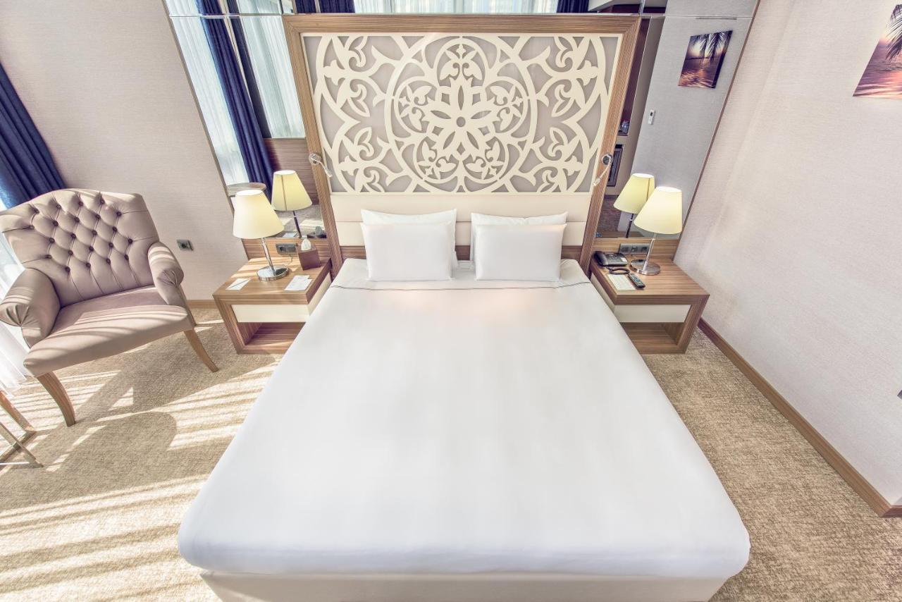 Downtown Ankara Hotel Eksteriør billede A bedroom