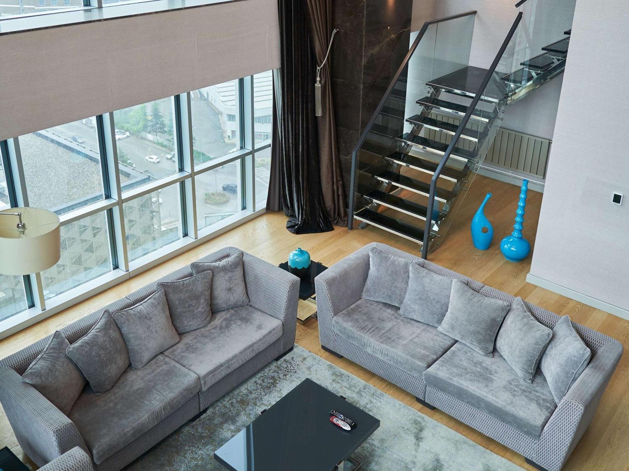 Downtown Ankara Hotel Eksteriør billede A living room in a duplex apartment